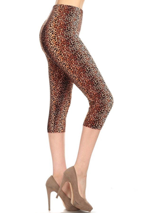 multi color print, cropped capri leggings in a fitted style with a banded high waist.