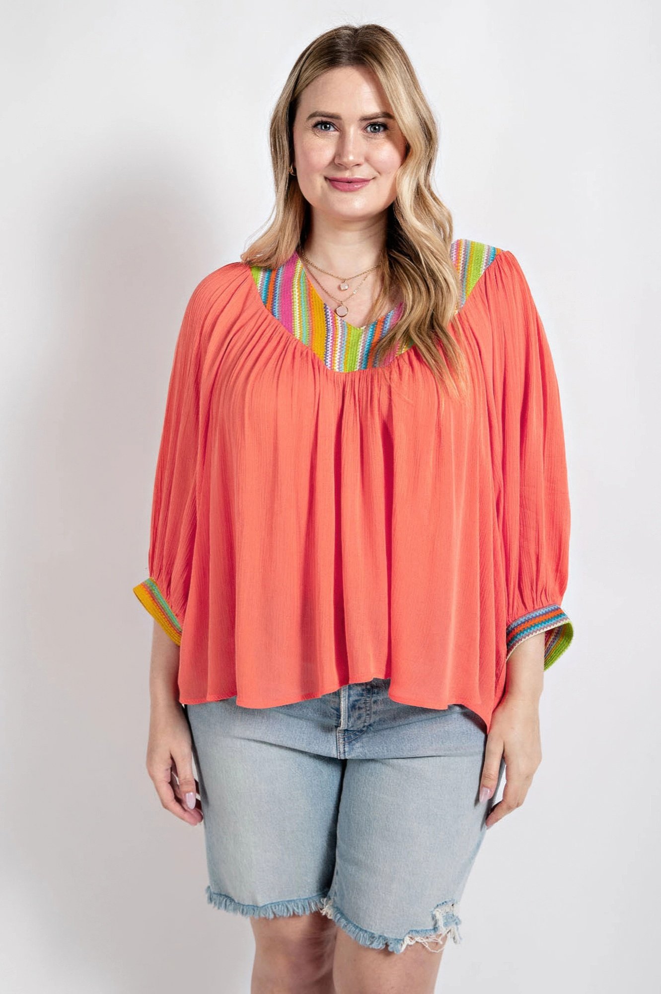 v neck flowy dolman sleeve top with stripe accents