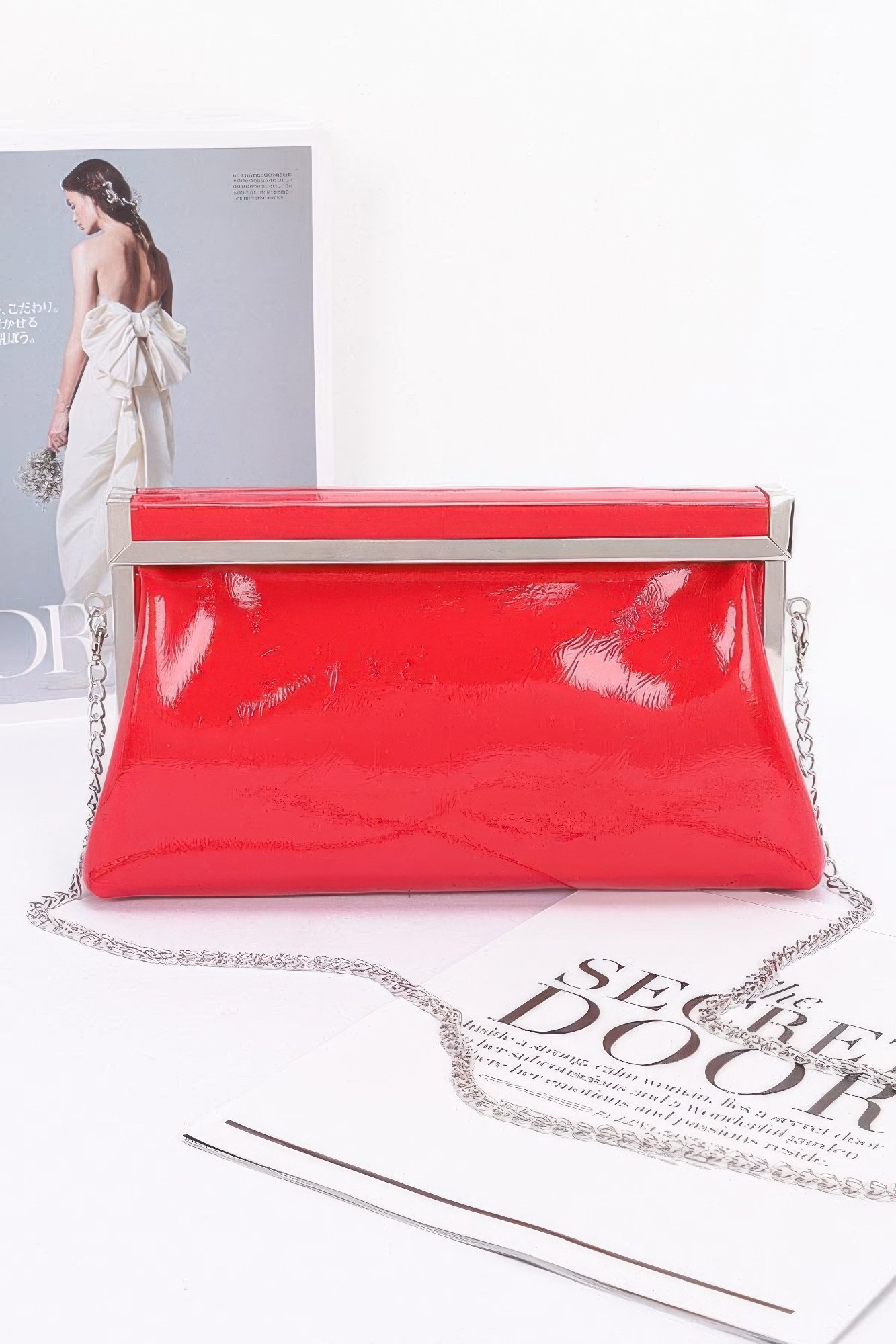 patent leather frame clutch bag