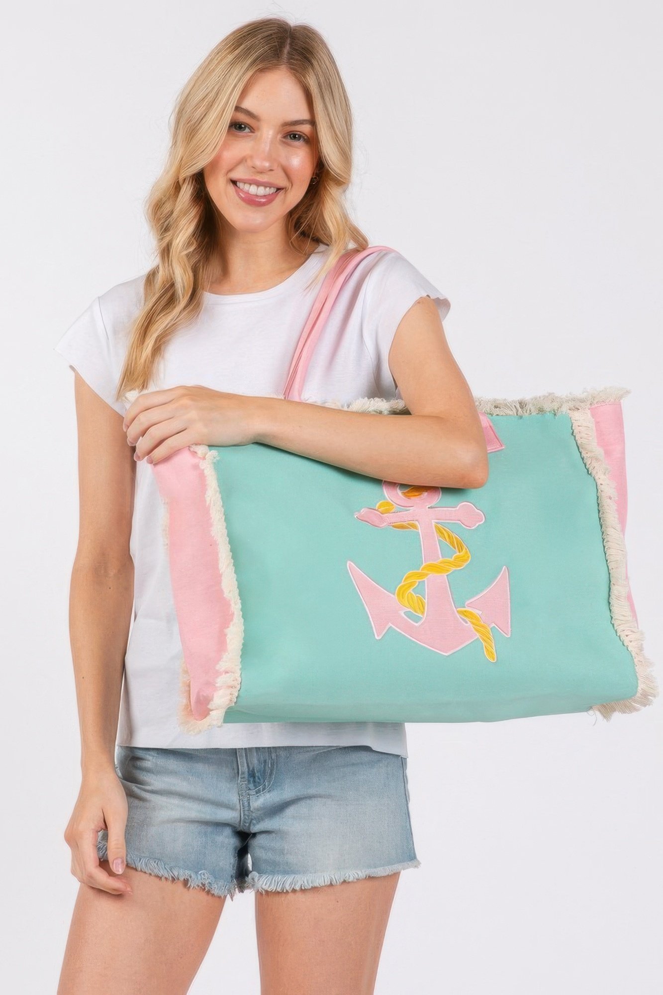 embroidered anchor patch fringe tote bag