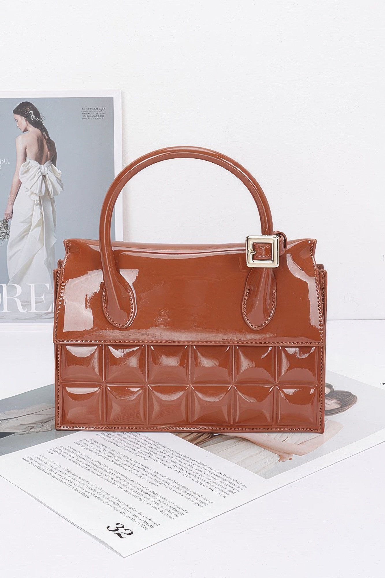 embossed enamel top handle bag