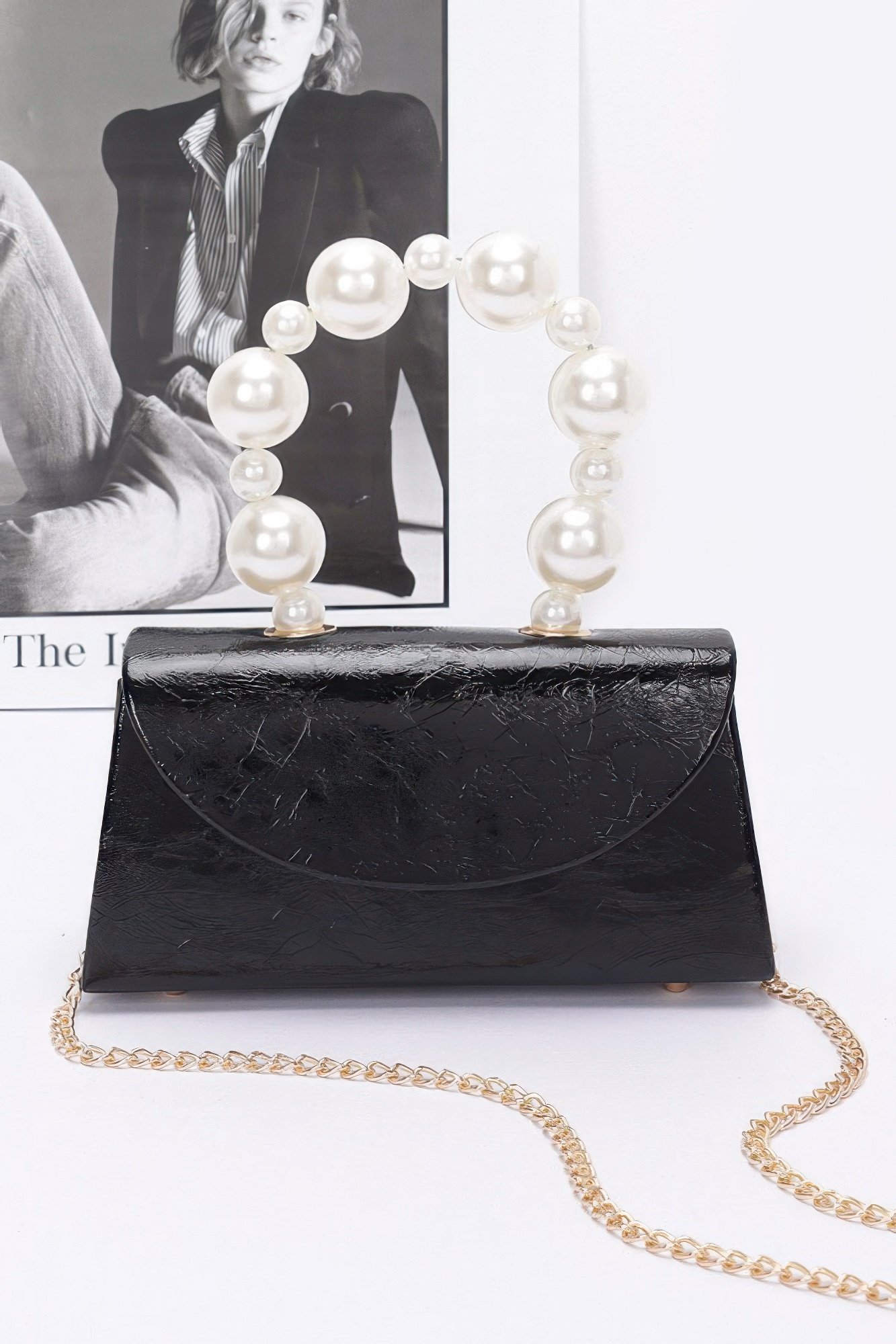 metallic pearl handle flap bag