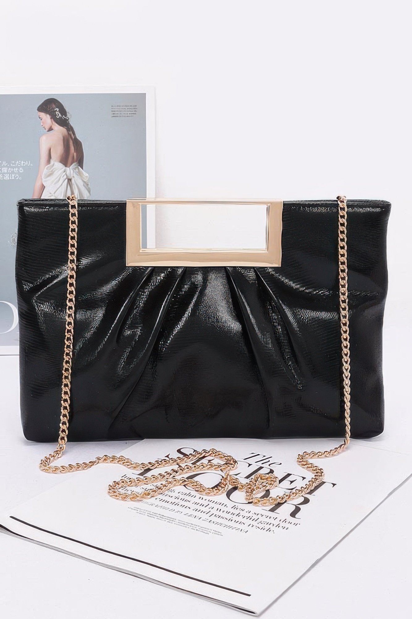 faux leather metal handle clutch