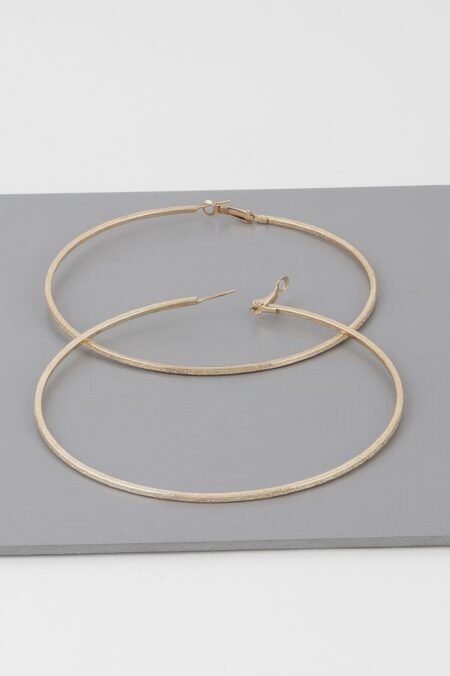 wide indented concrete hoop earrings